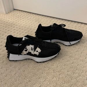 Women’s New Balance black with cow hide N  sneaker size 7